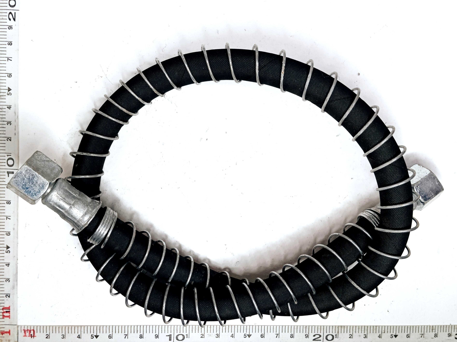 Шланг тормозной 4310 задний (гайка-гайка) в пружине 78см