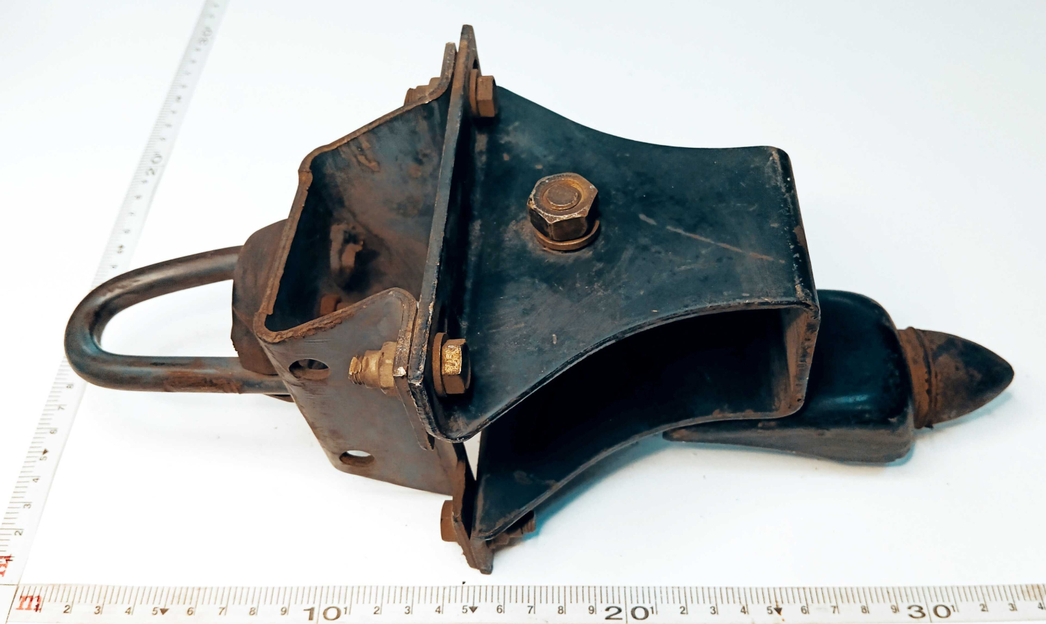 Кронштейн запора кабины Камаз левый в сборе с подушкой